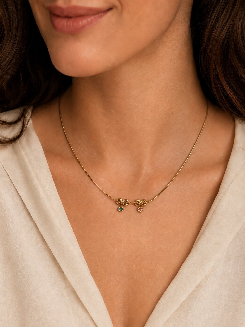 Avon Gold-Tone Knot Necklace with Pink and Green Stones